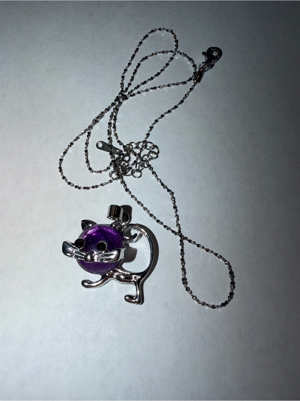 Silver Cat Pendant Necklace with Amethyst Gem